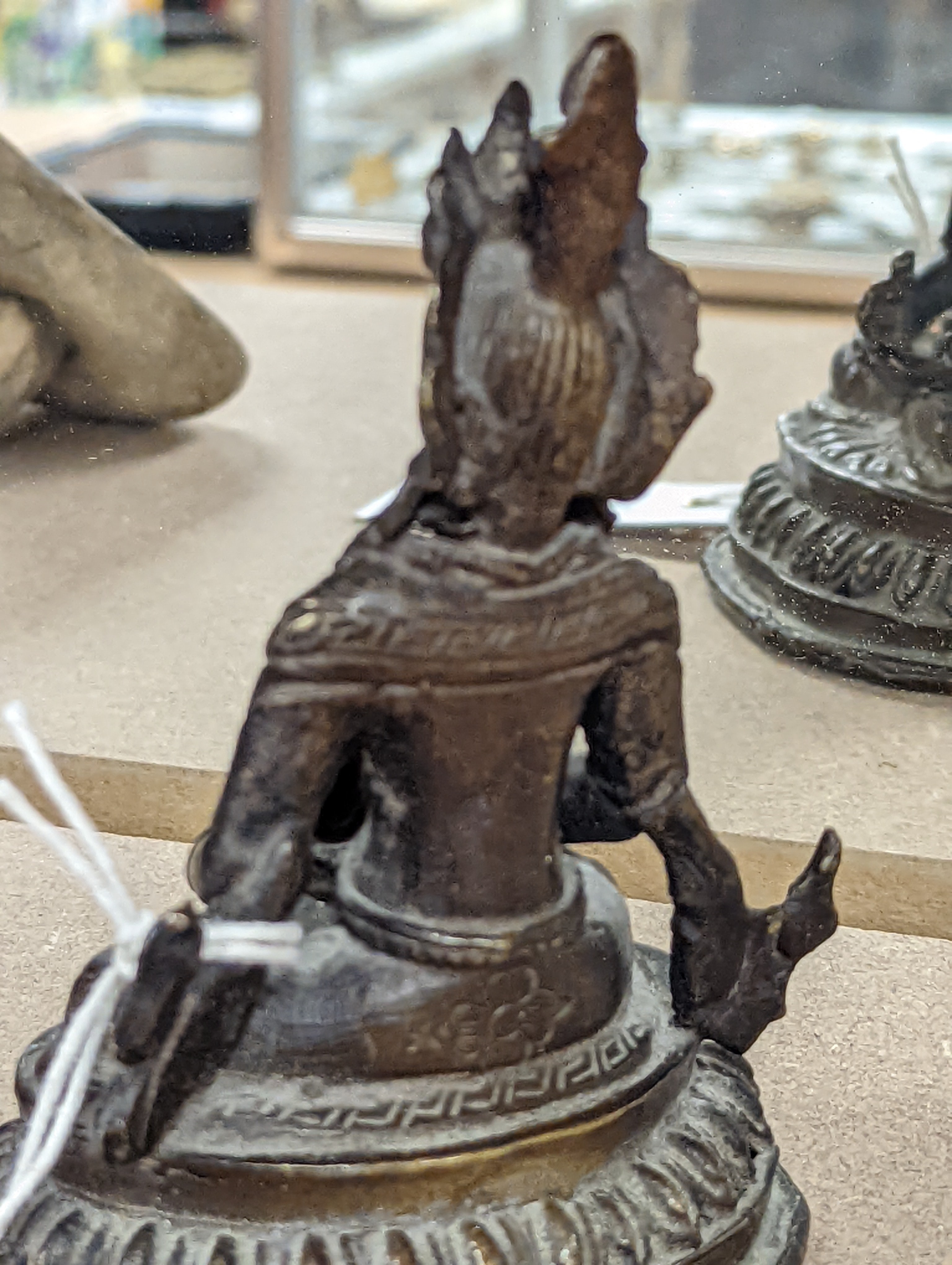 A 19th/20th century Himalayan bronze buddha 12cm